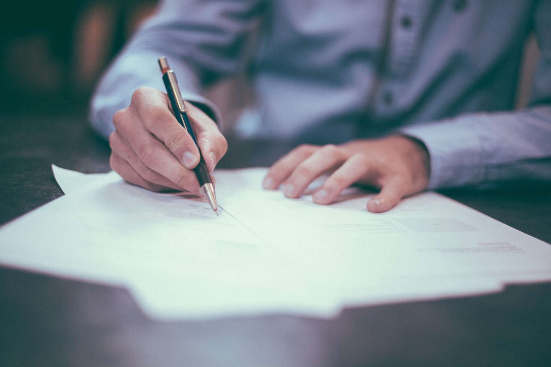 person signing a tender document